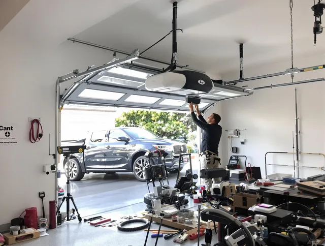 Sanford Garage Door Repair specialist installing smart garage door opener system in Sanford home