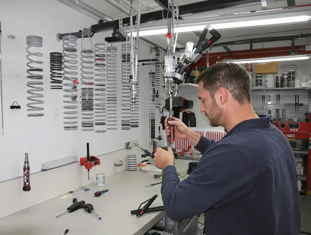 Sanford Garage Door Repair safety certified technician performing precision spring replacement in Sanford